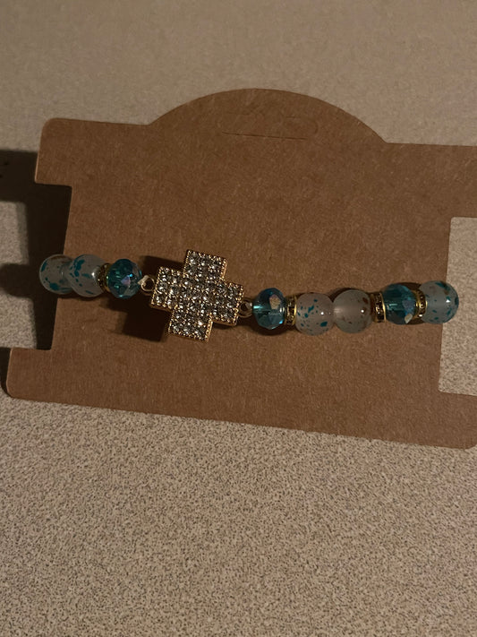blue cross bracelet